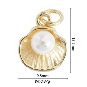 Detailed view of golden shell pendant with white pearl and dimensions 15.2mm by 9.8mm