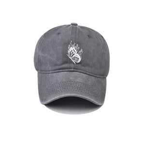 Washed dark gray cotton baseball cap with white butterfly and flame embroidery design