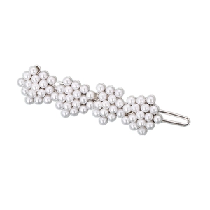 Elegant silver hair clip with four rhinestone pearls in a plum blossom flower design