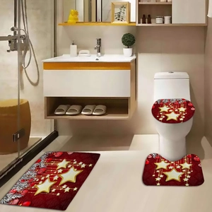 Three-piece red Christmas bathroom mat set with gold stars and festive ornaments detail