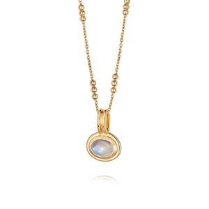 Close-up of golden multi-layer necklace with blue moonstone pendant and beaded chain
