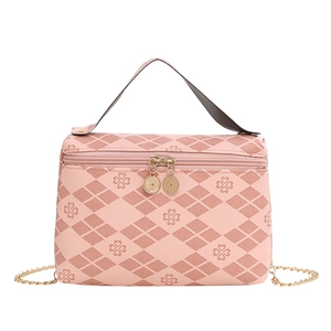 Pink quilted crossbody bag with heart clover pattern, double zipper and gold chain strap