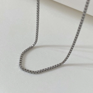 Minimalist silver stainless steel box chain necklace with a sleek and modern metallic finish
