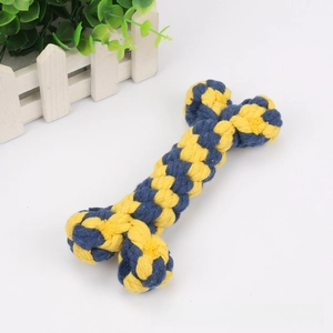 Close-up of a durable bone-shaped dog chew toy woven with blue and yellow cotton ropes