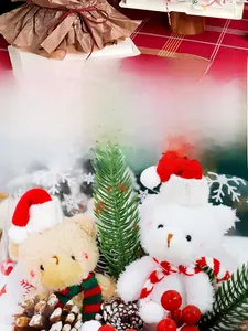 Close-up of plush Christmas bears with pine cones and red berries in floral gift packaging