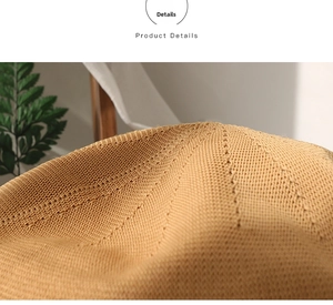 Macro shot of breathable woven texture on a sweet candy-colored beret hat for summer