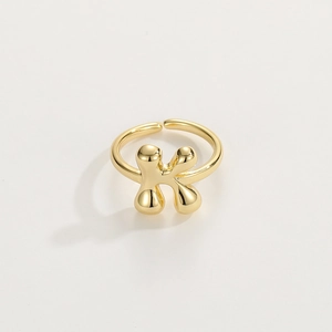 Detailed view of the 18K gold letter K ring with a polished open adjustable band