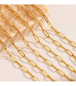 Detail of 18K gold plated stainless steel paperclip chains with glossy finish