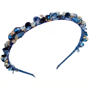 Exquisite headband with deep blue crystals and rhinestones on a silk-wrapped metal frame