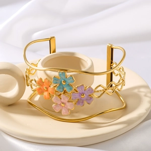 18k gold plated stainless steel open bangle with colorful enamel flowers on wavy band