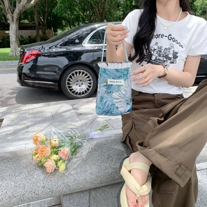 Blue floral jacquard bucket bag with white lace trim and Korean text label detail