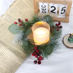 Artificial Christmas wreath candle holder with pine needles, berries and white candle