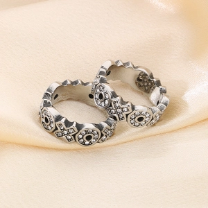 Vintage oxidized stainless steel rings with cross motifs and sparkling zircon inlays