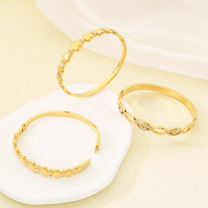 Luxuriöse 18K vergoldete Edelstahlarmbänder mit Zirkon-Kleeblatt und Evil-Eye-Designs