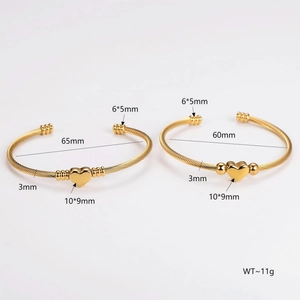 Gold stainless steel twisted cable heart bracelet in 60mm and 65mm inner diameters
