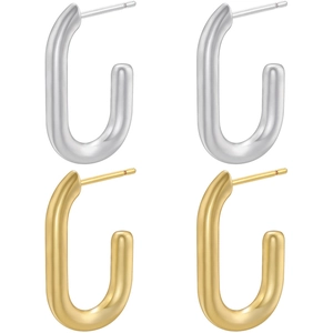 Detailed view of U-shaped gold and silver earrings with polished hollow texture