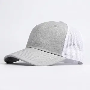 Gray and white patchwork trucker hat with breathable mesh and curved brim for sun protection