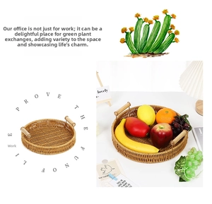 Detail of round woven fruit tray with sturdy wooden handles and dense rattan texture