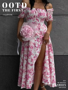 Detail of off-shoulder floral dress with puff sleeves, drawstring neckline and high slit