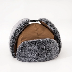 Winter brown trapper hat with gray faux fur lining and ear flaps for windproof warmth