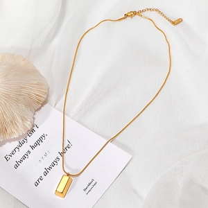 Gold plated stainless steel snake chain necklace with rectangular gold bar pendant for women
