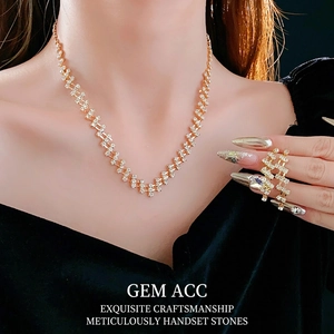 Luxury gold plated square diamond necklace and ring set worn by model for evening look