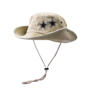 Detail of beige washed cotton sun hat featuring dual star embellishments and chin strap