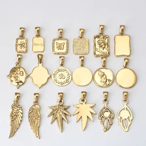 Golden stainless steel charms featuring butterfly, cross and prayer hand pendants in detail