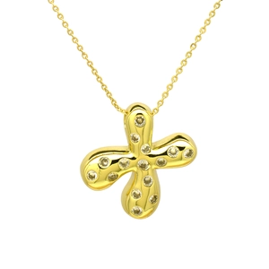 Detailed close-up of a gold clover pendant with inset sparkling crystals on a fine chain