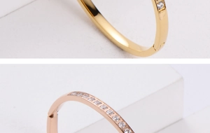 Macro detail of gold and rose gold bangles with paved cubic zirconia stones