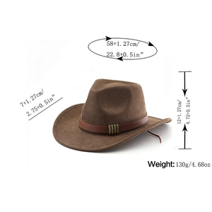 Close-up of brown suede cowboy hat with leather decorative band and golden metal buckle details