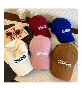 Close-up of stylish baseball caps with SHGAHINA 3D embroidery in multiple trendy colors