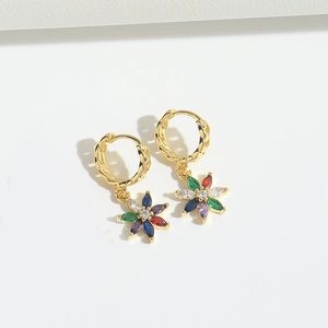 Detailed close-up of colorful crystal floral dangle earrings in gold-tone metal plating