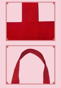 Close-up of red canvas wedding gift bag showing durable woven handle and reinforced stitching