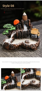 Macro detail of Zen mountain landscape incense burner with flowing backflow smoke effect