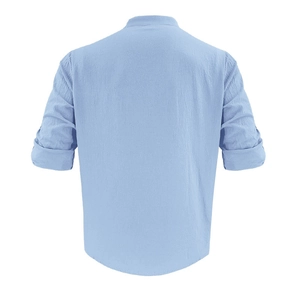 Close-up of light blue linen shirt back with detailed breathable fiber texture