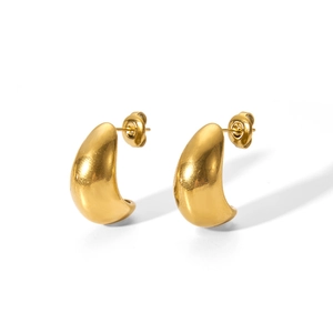Detail of 18k gold plated hollow bean earrings showing C-shape curve and secure backing