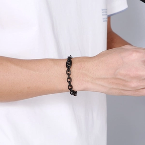 Close-up of black polished pig-nose chain link bracelet in high-quality stainless steel