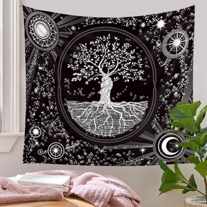 Detailed close-up of Bohemian tree of life tapestry with sun and moon celestial design