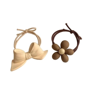 Minimalist cream bow and brown floral hair tie set for stylish ponytails in Korean style