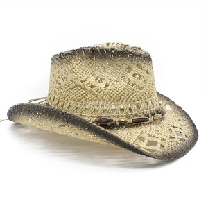 Detail of straw cowboy hat with hollow knit pattern, wood beads and vintage gradient edge