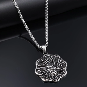 Retro Nordic Sun God pendant in distressed stainless steel with a classic wheat chain