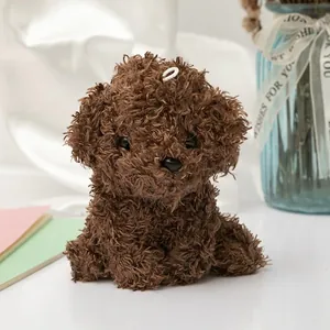 Cute brown curly plush puppy toy with hanging loop and soft long-fur texture