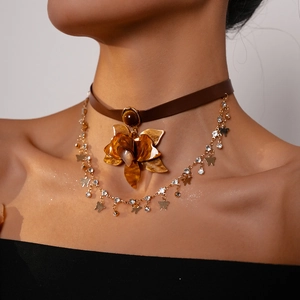 Vintage double-layer choker with amber resin flower and gold butterfly pendant