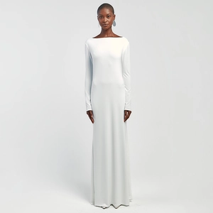 Elegant white long sleeve slim fit maxi dress with a minimalist floor-length silhouette
