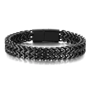 Detail of black double-row woven chain bracelet with a matte metallic finish and clasp
