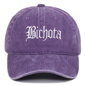 Detail of Bichota gothic embroidery on a purple washed cotton vintage baseball cap