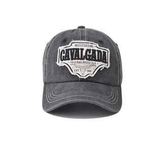 Detailed close-up of vintage washed grey cotton baseball cap with embroidered bull logo