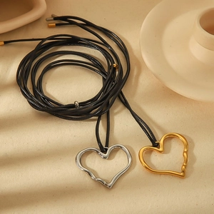Minimalist heart pendant necklaces in gold and silver finish with adjustable black wax cord