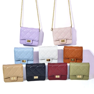 Quilted mini crossbody bags with gold chain straps in various colors and metallic lock